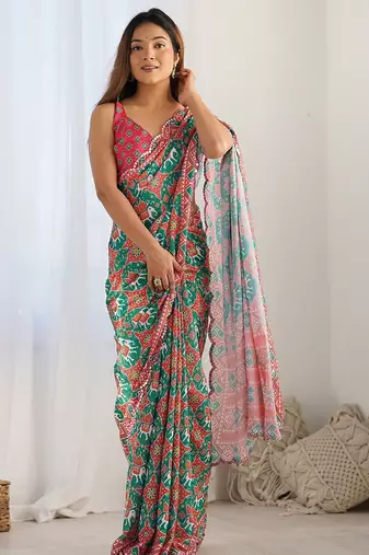 Green ethnic motifs printed mirror work border saree with blouse piece
