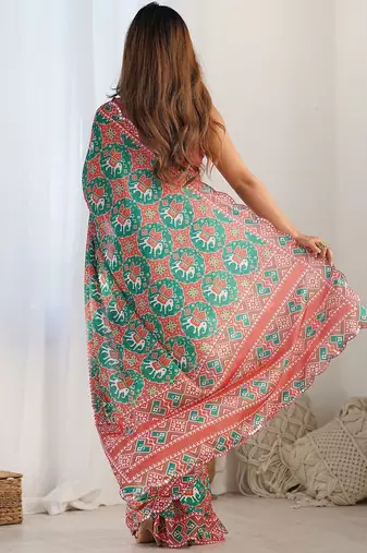 Green ethnic motifs printed mirror work border saree with blouse piece