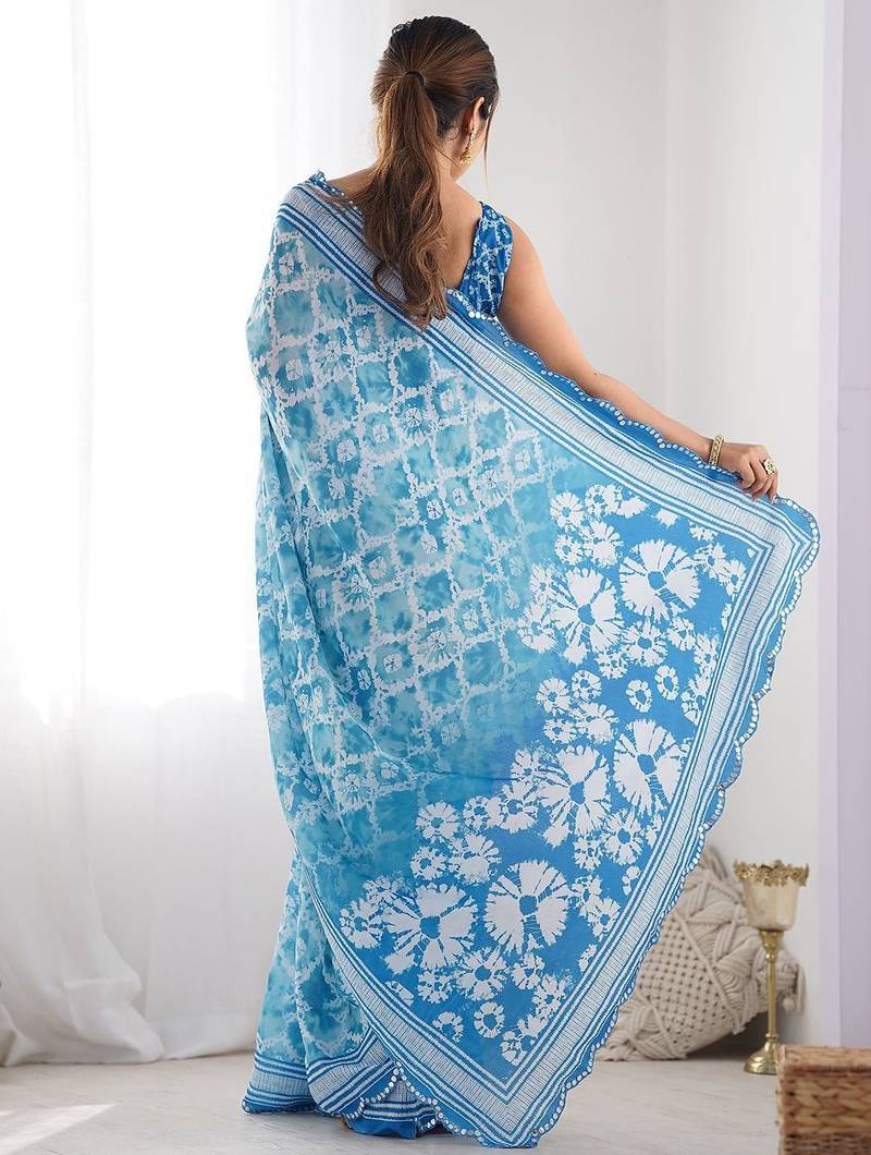Blue floral printed mirror work saree with unstitched blouse piece