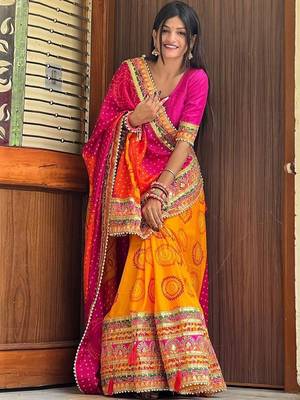 Orange bandhani embroidered pure chiffon saree 1