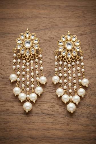 White pearl kundan tassle earrings
