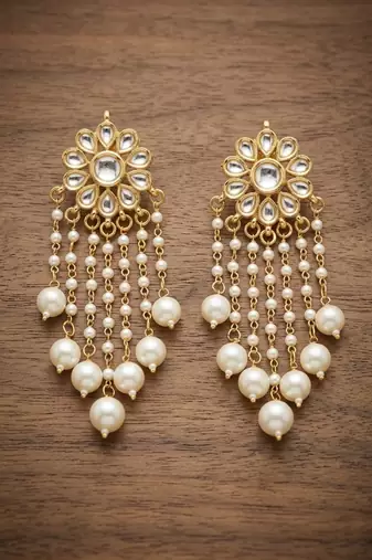 White pearl kundan tassle earrings
