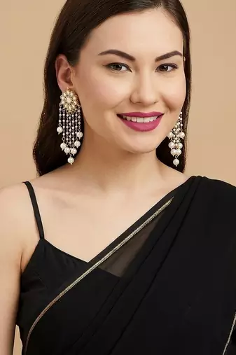 White pearl kundan tassle earrings