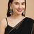 White pearl kundan tassle earrings