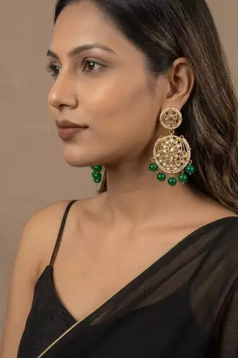 Green kundan earrings