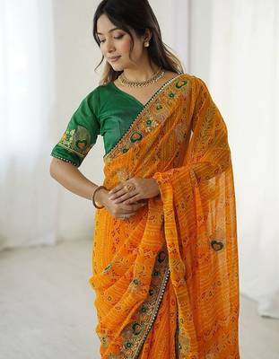 Orange ethnic motifs embroidered pure georgette saree 1