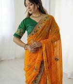 Orange ethnic motifs embroidered pure georgette saree