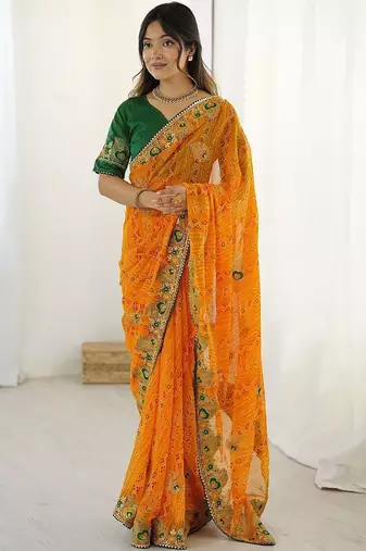 Orange ethnic motifs embroidered pure georgette saree