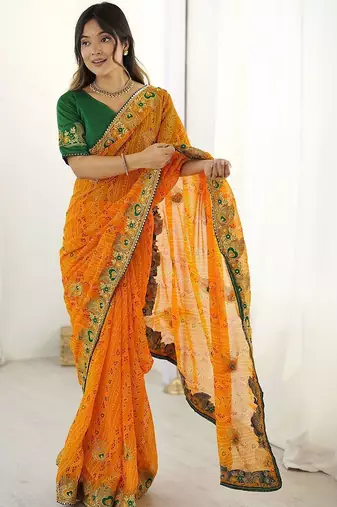 Orange ethnic motifs embroidered pure georgette saree