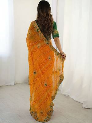 Orange ethnic motifs embroidered pure georgette saree 4