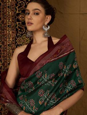 Green ethnic motifs silk cotton ikat saree 1
