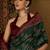 Green ethnic motifs silk cotton ikat saree
