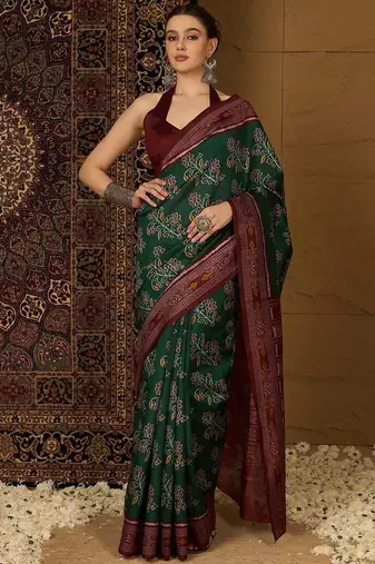 Green ethnic motifs silk cotton ikat saree