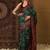 Green ethnic motifs silk cotton ikat saree