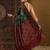 Green ethnic motifs silk cotton ikat saree