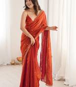 Rust ethnic motifs embroidered bagh saree
