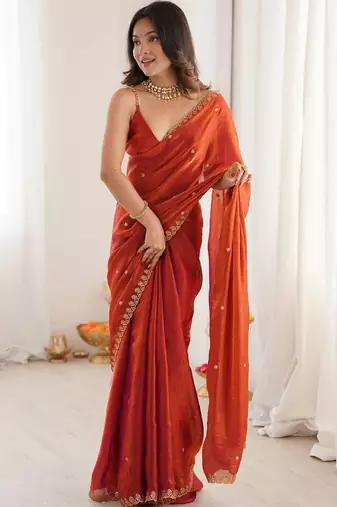 Rust ethnic motifs embroidered bagh saree