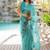 Turquoise floral organza saree