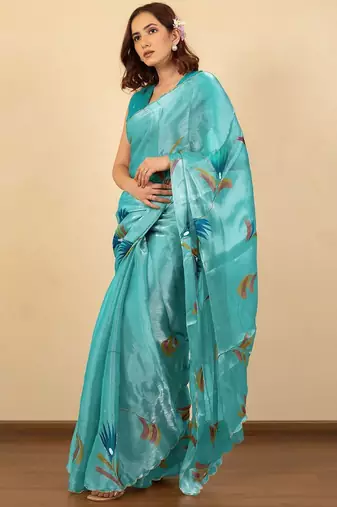 Turquoise floral organza saree