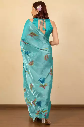 Turquoise floral organza saree