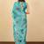 Turquoise floral organza saree