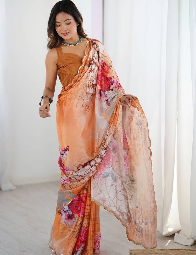 Peach floral sequinned pure chiffon saree