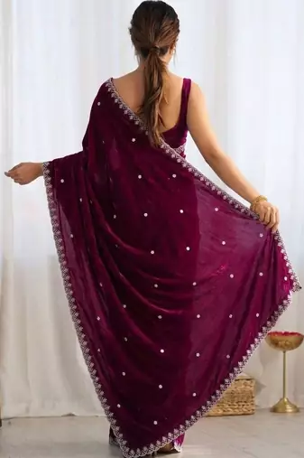 Purple ethnic motifs embroidered bagh saree