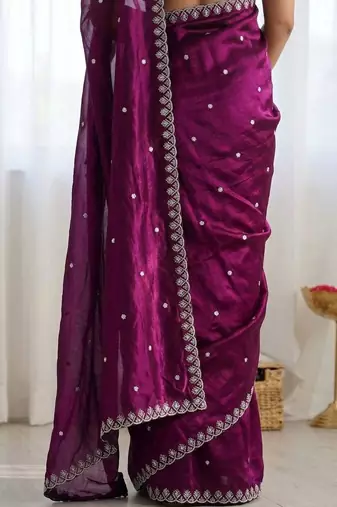 Purple ethnic motifs embroidered bagh saree