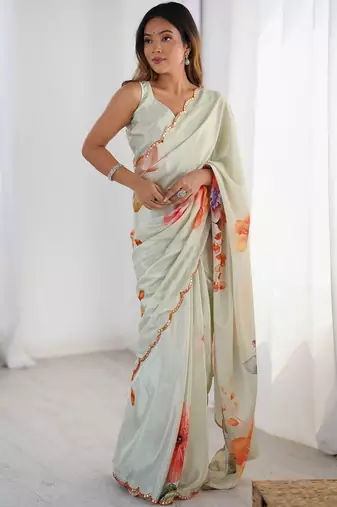 Sea green floral sequinned pure chiffon designer saree