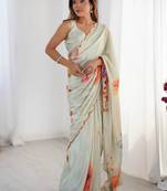 Sea green floral sequinned pure chiffon designer saree