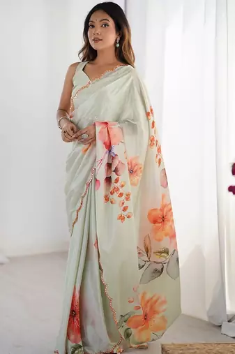 Sea green floral sequinned pure chiffon designer saree