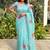 Turquoise floral printed cotton linen sarees