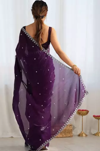 Purple ethnic motifs embroidered bagh saree