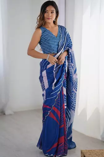 Blue sequinned pure chiffon saree