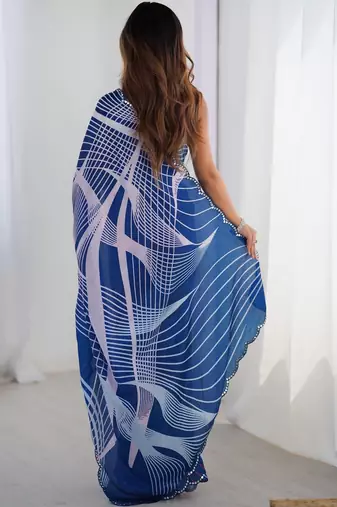 Blue sequinned pure chiffon saree