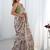 Beige pure chiffon ikat saree