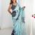 Turquoise floral sequinned pure chiffon saree