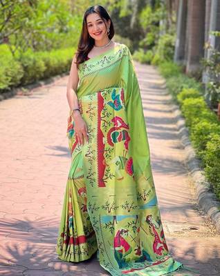 Green woven design zari paithani saree 1