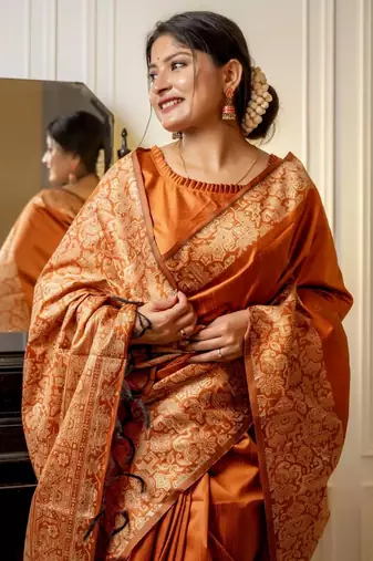 Orange woven design saree with unstitched blouse piece