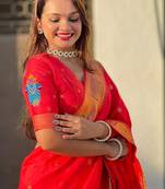 Red ethnic motifs woven design zari designer paithani saree