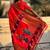 Red ethnic motifs woven design zari designer paithani saree