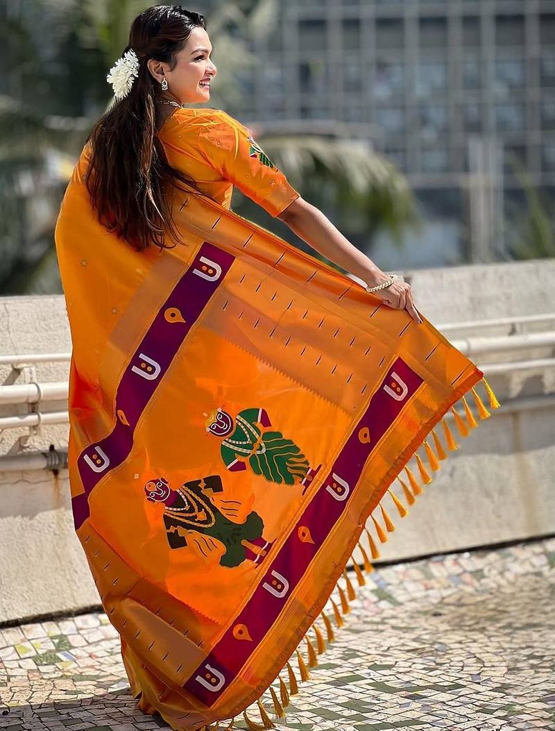 Orange woven design silk blend paithani saree