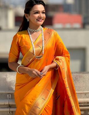 Orange woven design silk blend paithani saree 3