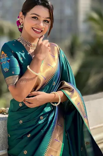 Teal floral woven design zari paithani saree