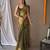 Green woven design zari tissue saree