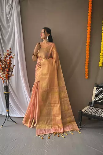 Peach woven design zari tissue saree with unstitched blouse piece