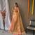 Peach woven design zari tissue saree with unstitched blouse piece