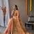 Peach woven design zari tissue saree with unstitched blouse piece