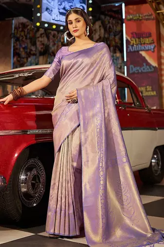 Purple ethnic motifs woven design saree