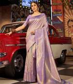 Purple ethnic motifs woven design saree